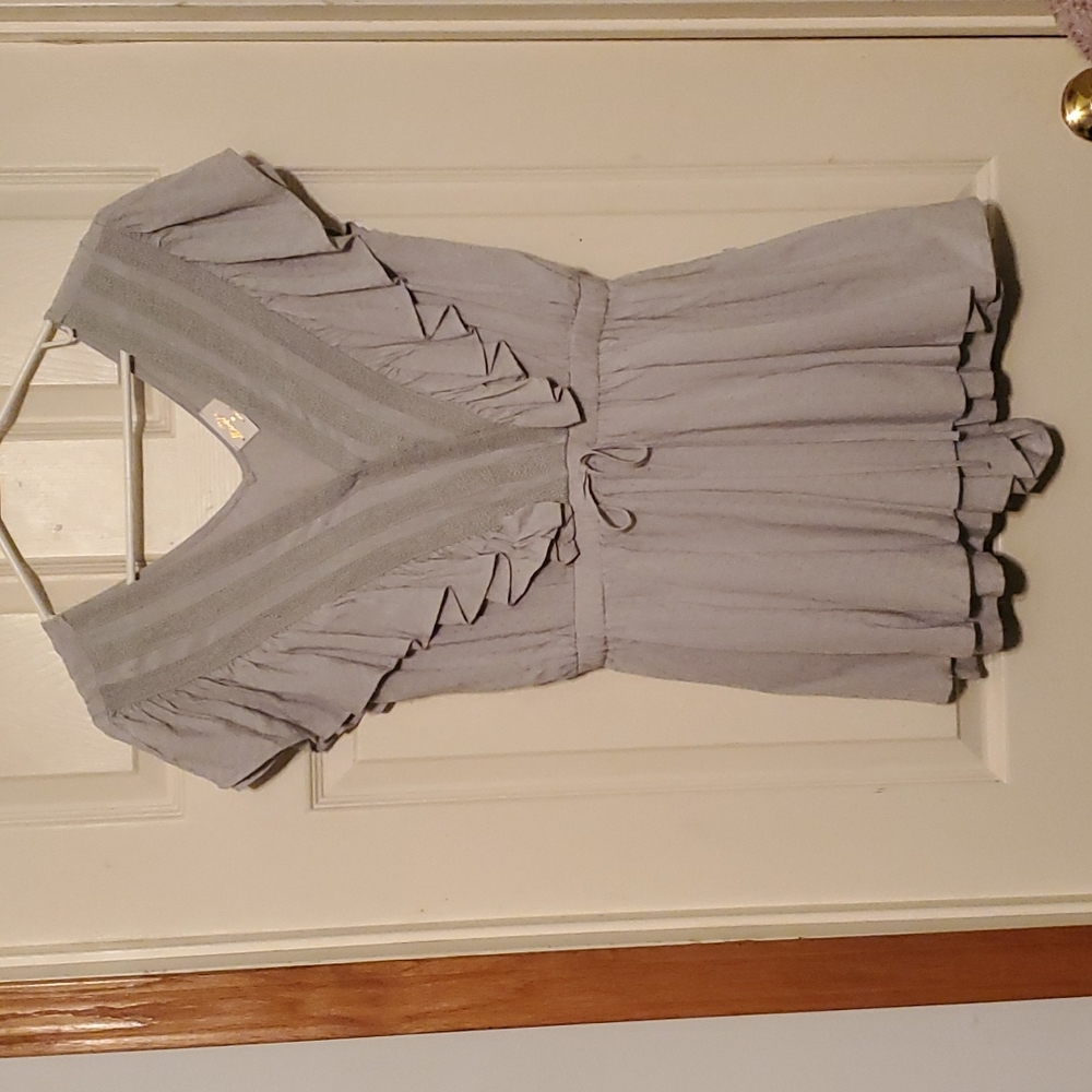 Allie Rose size medium romper. Never worn. Light sage green in color.